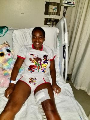 a few days post surgery, wearing the PowerGirls t-shirt